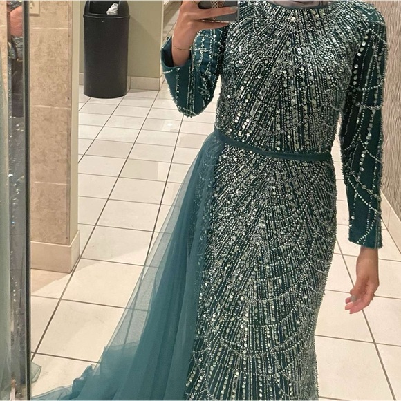 A teal evening gown beaded and sparkly, size 4, comes with a side skirt. - Picture 3 of 4